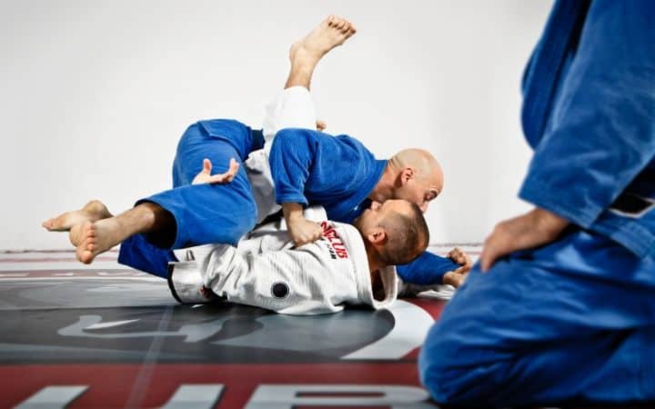 Two men sparring in BJJ training | Jiu Jitsu Legacy