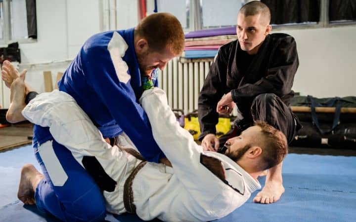 Instructor and students sparring | Jiu Jitsu Legacy
