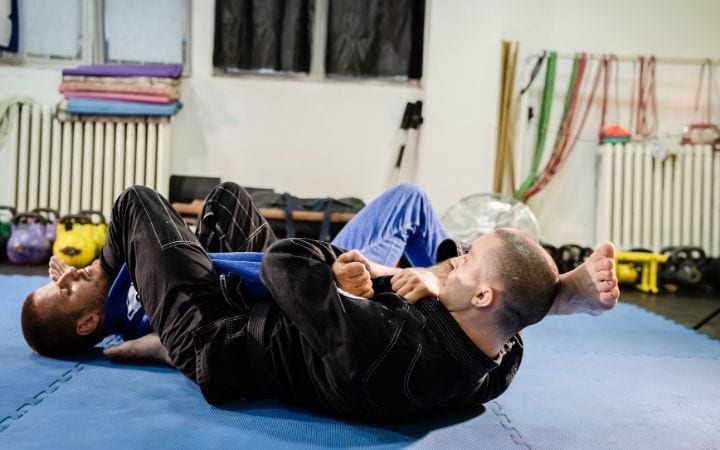 Two men training Jiu Jitsu, The Best BJJ Conditioning Tools for Endless Cardio | Jiu Jitsu Legacy