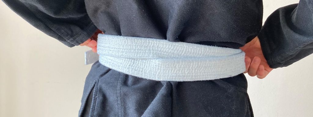How to Tie a Jiu Jitsu Belt (And Have it Stay Tied!) 7 How to Tie a Jiu Jitsu Belt (And Have it Stay Tied!) how to tie a jiu jitsu belt